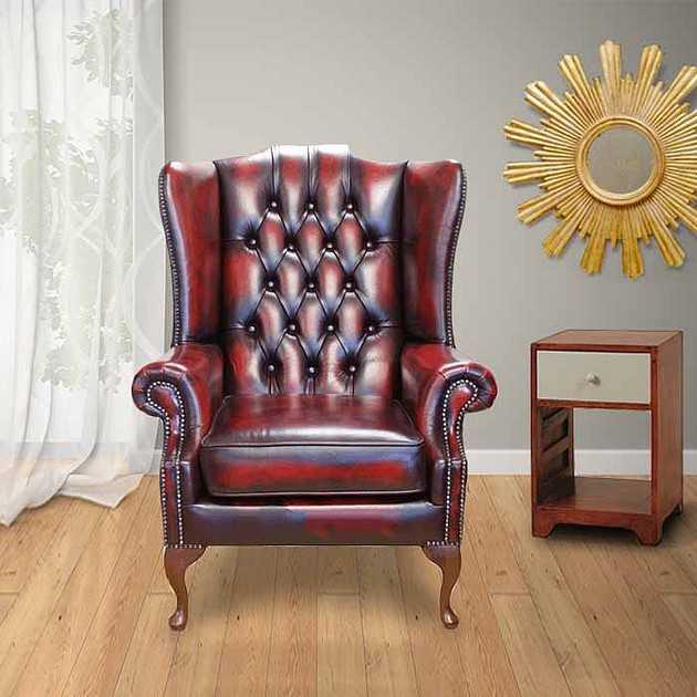 Кресло в английском стиле: уютная деталь в интерьере гостиной